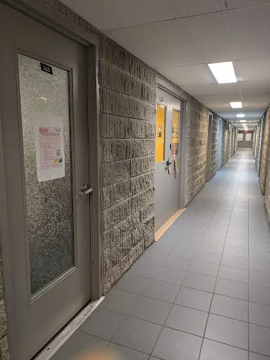 The basement hallway outside the Burrow